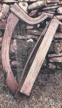 34 brass wire-strung harp, with a frame of cherry and soundbox made from of one piece of willow