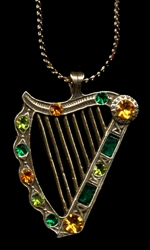 H1056 Antiqued gold finished harp pendant with Harvest Combo stone set